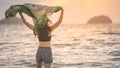 A woman chill the sunset on the sea