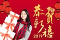woman with chinese new year 2019 concept.chinese text happ