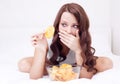 Woman with chips Royalty Free Stock Photo