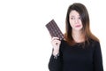 Woman with chocolate bar desire temptation expression in white background