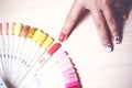 Woman choose the color of Polish for manicure. design for nails. testers nail Polish.Fashion manicure.