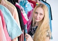 Woman chooses clothes in the wardrobe closet Royalty Free Stock Photo