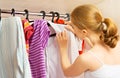 Woman chooses clothes in the wardrobe closet at home Royalty Free Stock Photo