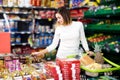 Woman choosing delicious sweets Royalty Free Stock Photo