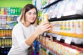 Woman choosing healthy baby food Royalty Free Stock Photo