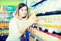 Woman choosing healthy baby food Royalty Free Stock Photo