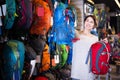 Woman choosing new rucksack Royalty Free Stock Photo