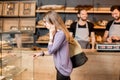 Woman choosing pastry in the shop Royalty Free Stock Photo