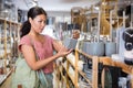 Woman choosing soap dispencer