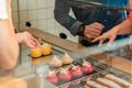 Woman choosing sweet pastry in confectionery Royalty Free Stock Photo