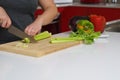 Woman chopping celery Royalty Free Stock Photo