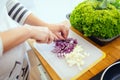 Woman chopping onions