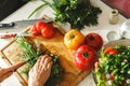 Woman chopping parsley and dill for healthy vegetarian salad Royalty Free Stock Photo