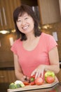 Woman Chopping Vegetables Royalty Free Stock Photo