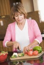 Woman Chopping Vegetables Royalty Free Stock Photo