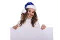 Woman in Christmas cap holding blank informational