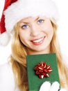 Woman in christmas clothes holding present Royalty Free Stock Photo