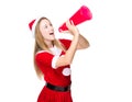 Woman with Christmas dress yell with megaphone Royalty Free Stock Photo