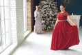 Woman at Christmas. Fat woman in a beautiful dress for a holiday. Royalty Free Stock Photo