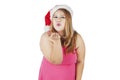 Woman in christmas hat blowing a kiss Royalty Free Stock Photo