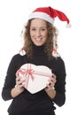 Woman with christmas hat and box of chocolate Royalty Free Stock Photo