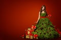 Woman Christmas Tree Dress with Present Gift, Xmas Fashion Gown Royalty Free Stock Photo