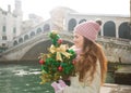 Woman with Christmas tree near Rialto Bridge in Venice, Italy Royalty Free Stock Photo