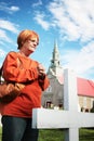 Woman at church cemetery Royalty Free Stock Photo