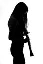 Woman with a clarinet - shadow Royalty Free Stock Photo