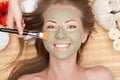 Woman with clay facial mask