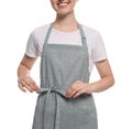 Woman in clean apron with pattern on white background, closeup Royalty Free Stock Photo