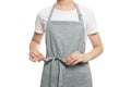 Woman in clean apron with pattern on white background, closeup Royalty Free Stock Photo