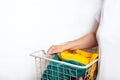 Woman with clean clothes in laundry basket. Royalty Free Stock Photo