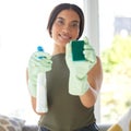 Woman cleaner, cleaning with chemical and sponge in portrait and cleaning service, house work and housekeeper with smile Royalty Free Stock Photo