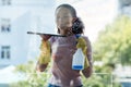 Woman cleaner, cleaning window and spray bottle with detergent, liquid soap and squeegee with housekeeping. Female Royalty Free Stock Photo