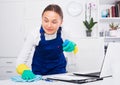 Woman cleaning at company office Royalty Free Stock Photo