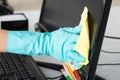 Woman Cleaning Desktop Screen With Rag Royalty Free Stock Photo