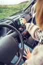 Woman cleaning dust of the car dashboard Royalty Free Stock Photo