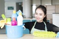 Woman with cleaning equipment ready to clean house or office Royalty Free Stock Photo