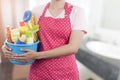 Woman with cleaning equipment ready to clean house Royalty Free Stock Photo