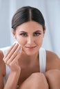 Woman Cleaning Face With Cosmetic Cotton Pad, Removing Makeup