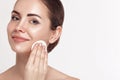 Woman Cleaning Face With White Pad. Beautiful Girl Removing Makeup White Cosmetic Cotton Pad. Happy Smiling Female Taking Off Make