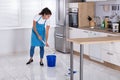 Woman Cleaning Floor With Mop Royalty Free Stock Photo