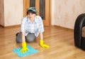 Woman cleaning the floor with a rag Royalty Free Stock Photo