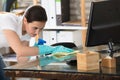 Woman Cleaning The Glass Office Desk Royalty Free Stock Photo