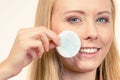 Woman cleaning her face skin with cotton pad Royalty Free Stock Photo