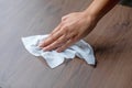 Woman cleaning home office table surface with wet wipes stock photo Royalty Free Stock Photo