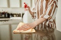 Woman Cleaning Kitchen Counters