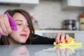 Woman cleaning kitchen tiles at home Royalty Free Stock Photo