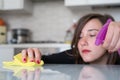 Woman cleaning kitchen tiles at home Royalty Free Stock Photo